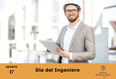 Un ingeniero con casco y tablet celebra el Día del Ingeniero en un sitio de construcción.